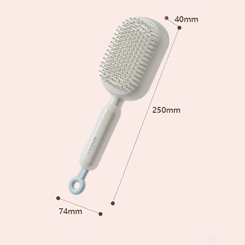 Brosse à cheveux portable à coussin d’air