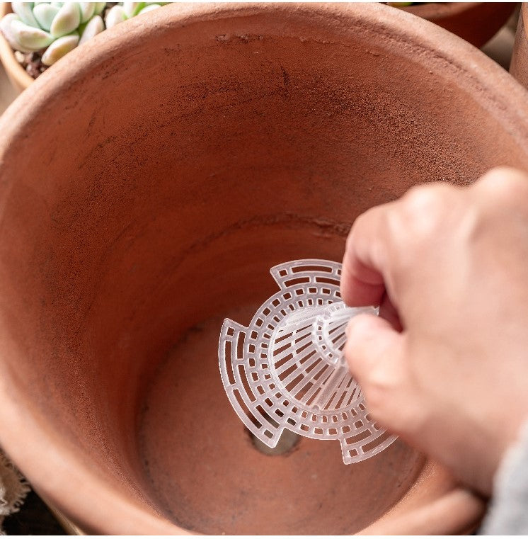 Dispositif de drainage anti-pourriture des racines pour jardinière