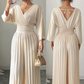 Combinaison élégante à col en V plissé et jambes larges – Chic, confortable et parfaite pour toutes les occasions