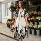 👗 57% de réduction✨Robe midi élégante à col en V et imprimé botanique🍂